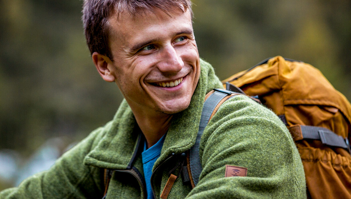 Grüner Kragenhuber Mann mit grüner Lodenfleecejacke